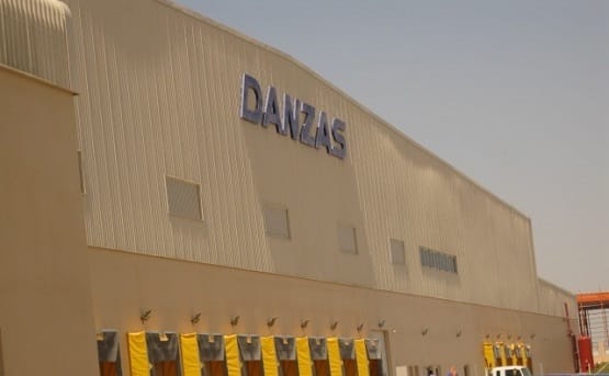 Exterior of industrial building with Danzas logo on the side